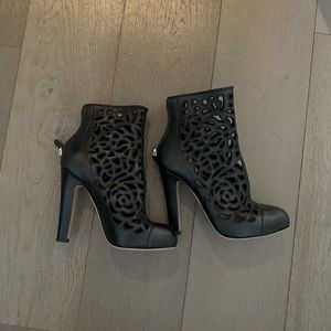 Valentino laser cut black leather booties